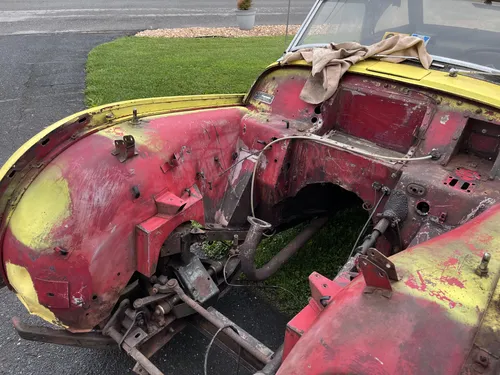 Yellow Triumph TR3